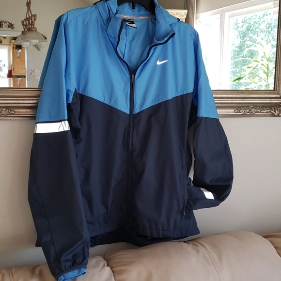 Nike Jackets & Coats Nike Running Reflective Light Jacket Poshmark